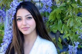 portrait of a model with brown eyes in the garden