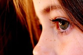 Redhead Child girl portrait, Eye close up