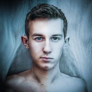 contrast image of a young man close-up