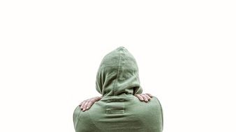 man in a green sweater and hood