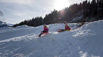 children having winter fun