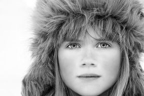 girl in a fur hat with a beautiful face