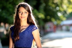 Elegant Girl with Long Hair and Blue Eyes