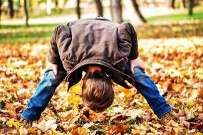 Toddler looking through legs