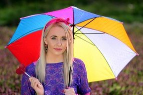 blonde with colorful umbrella