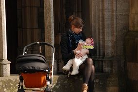 Baby and Mother on a city street