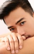 profile portrait of a young Thai man