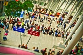 people in the Dusseldorf airport terminal