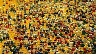 a lot of people is sitting on chairs, LEGO toys