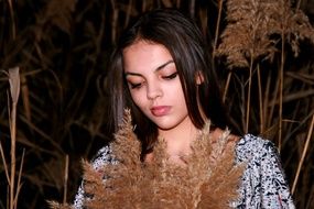 Portrait of girl and reed