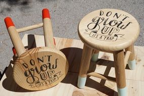 wooden chairs with inscriptions