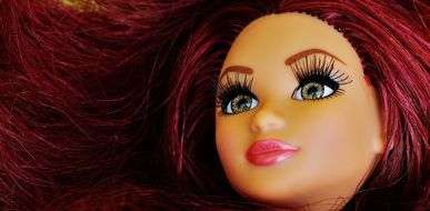 pretty doll face with long lashes