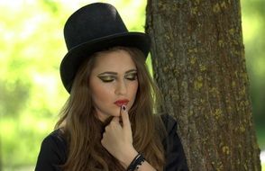 thoughtful girl with topper