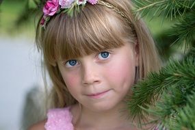 girl near the Christmas tree