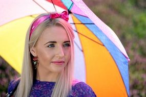 beautiful blonde with colorful umbrella