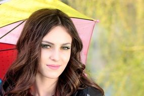 beautiful brown-haired girl with umbrella