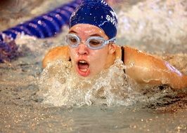Swimmer in the swimming pool on the competition