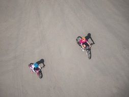 Children riding on a bikes on a road