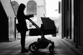 Black and white photo of the girl with the baby