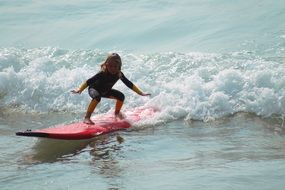 girl on the surf in the ocean