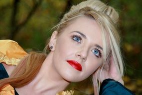 blonde with blue eyes and red lips