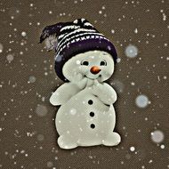 illustration of a snowman on the textured paper