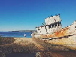 old ship near the shore