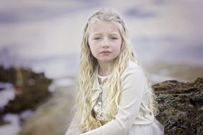 sad child girl with long white hair