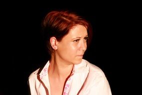 portrait of red-haired girl with brown eyes
