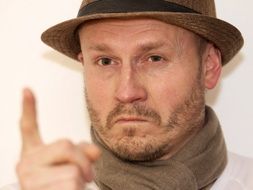 Portrait with the man showing finger