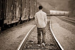 picture of the male is on a railway