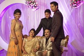 Wedding couple with parents, Indian Family Together