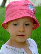 Beautiful child in pink cap