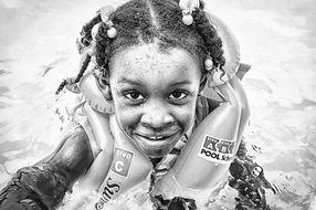 girl in a swimming vest black white photo