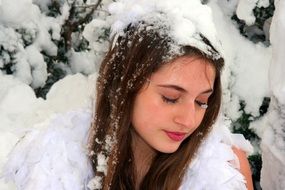 Portrait of sensual girl in the snow