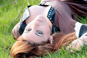 seductive model on the green grass
