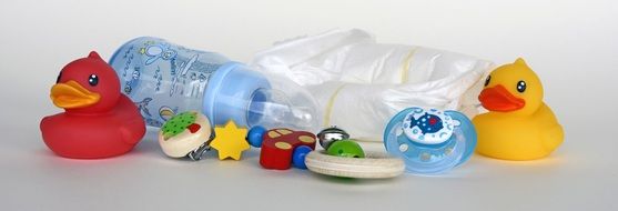 baby bottle and rubber ducks
