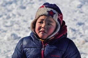 child in the cold in tears