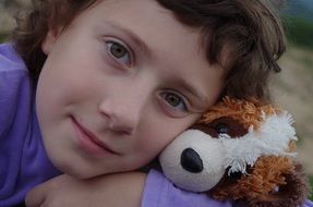 Child with the toy