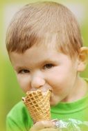 child eats ice cream