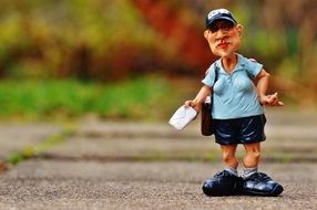 a civil servant with a letter in his hand on the track in the park