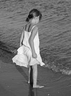 monochrome picture of the Girl is on a seaside