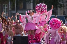 girls in pink costumes at the parade