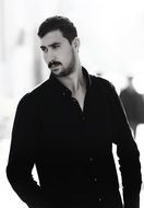 young turkish man in black