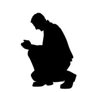 Black silhouette of Praying Man