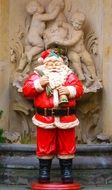 Santa Claus figure in a red suit