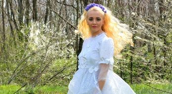 beautiful blonde in white dress