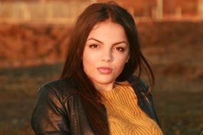 portrait of a sensual girl in a leather jacket