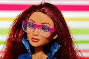 doll with red hair and glasses