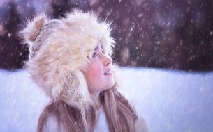 girl in a fur hat under the falling snow